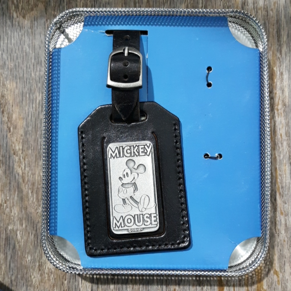 #612 Disney Mickey mouse luggage tag in colectors tin.